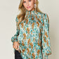 Double Take Full Size Printed Smocked Long Sleeve Blouse