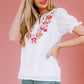 Embroidered Notched Neck Flounce Sleeve Top